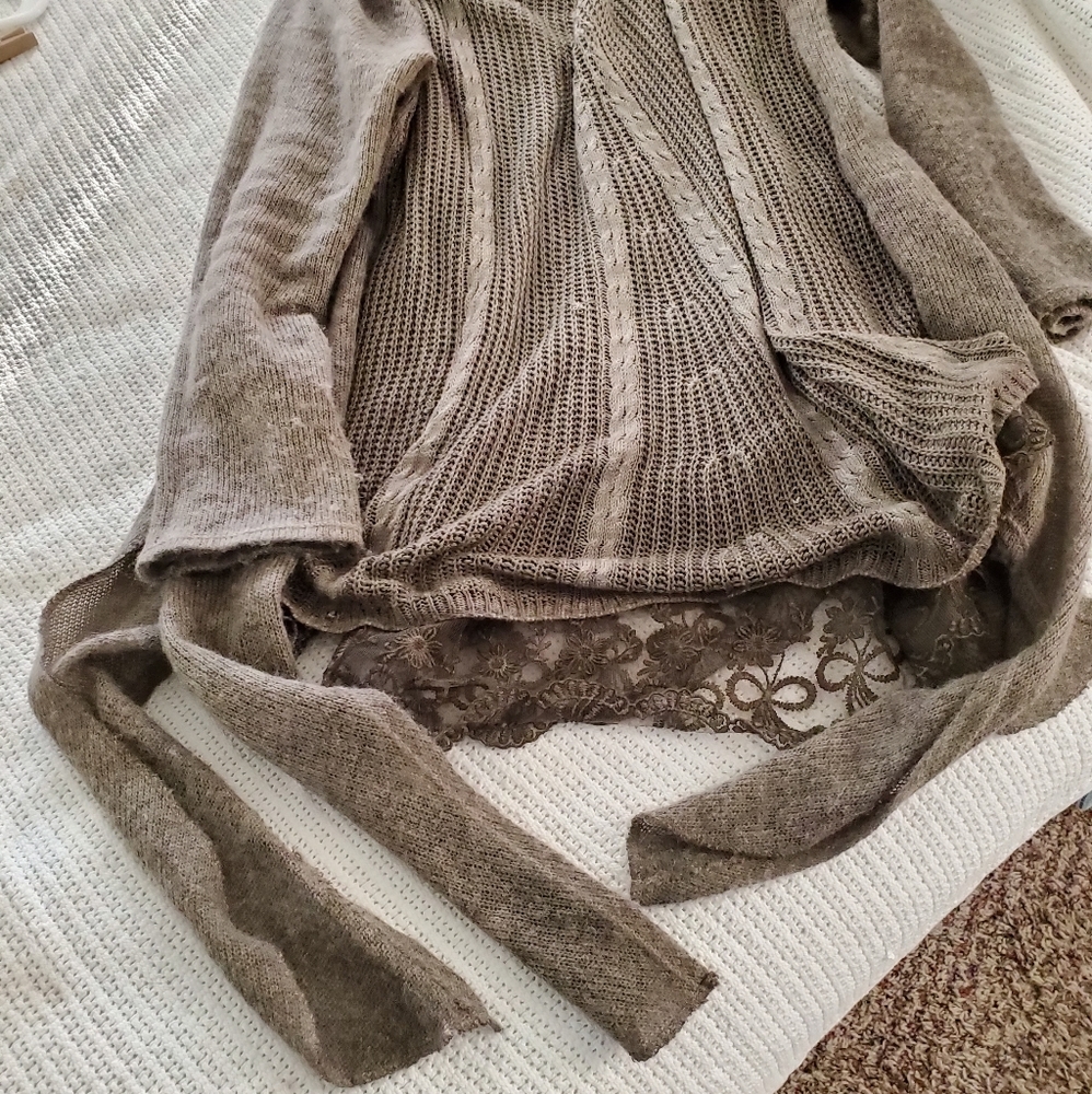 Sweater with attached extender